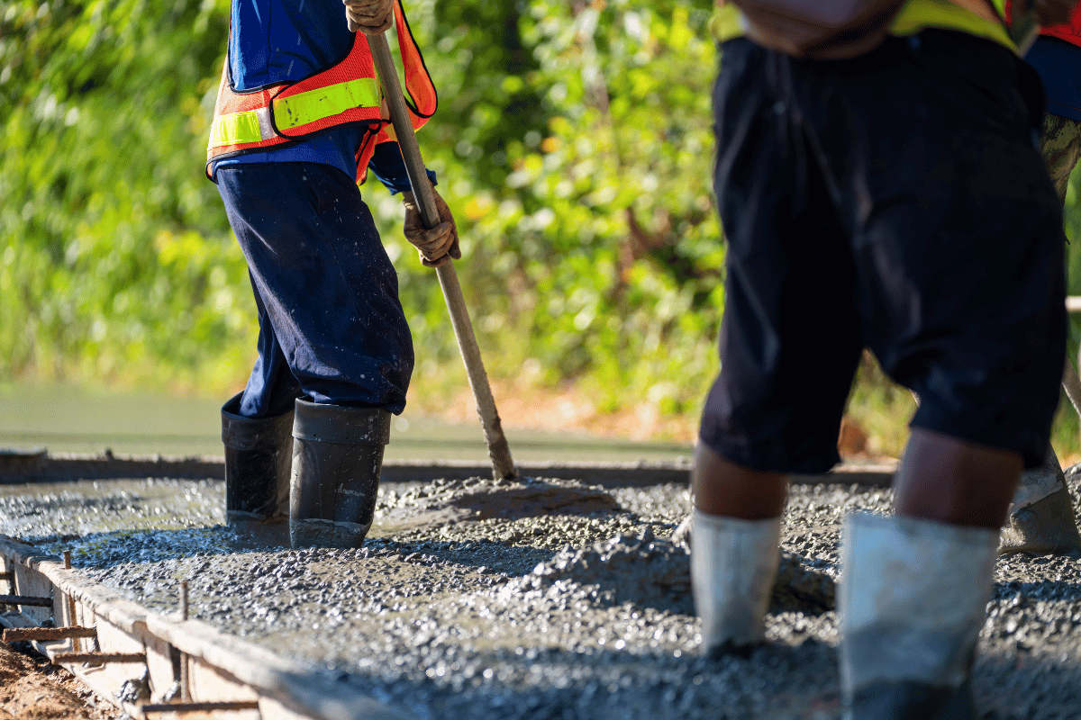 pouring concrete walkway trowel construction