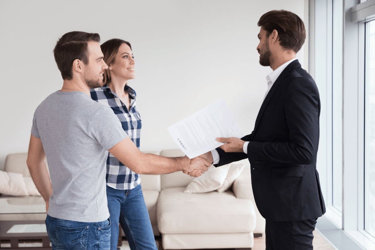 landlord tenant handshake modern apartment rental agreement home